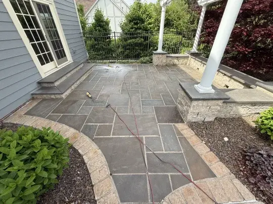 After photo: rebuilt chimney with clean brickwork